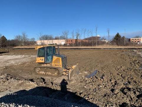 dozer grading soil